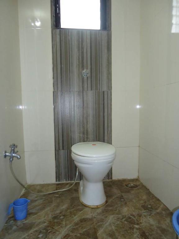 Hotel Sai Galaxy Inn Sirdi Szoba fotó